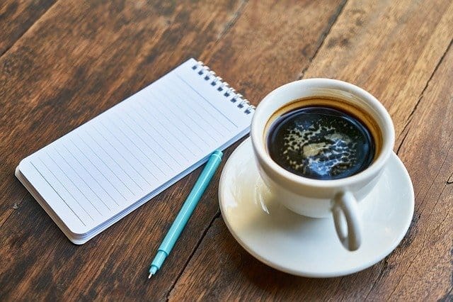 Tasse Kaffee, Notizblock, Stift